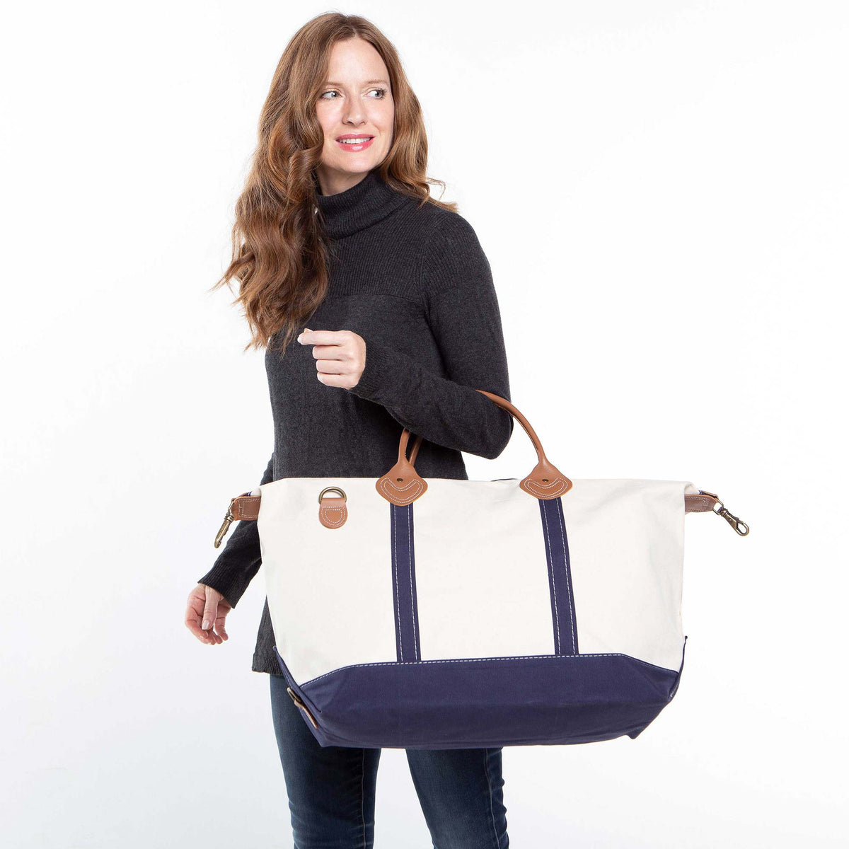 Monogram Weekender Bag carried on the shoulder